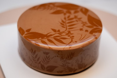 Kirsten Tibballs’ Exotique mousse cake with a screen-printed design.