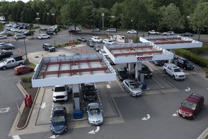 Gas customers swarm a COSTCO gas station amid fears of a gas shortage in Richmond, Va., Tuesday, May 11, 2021.