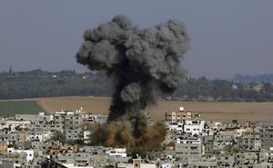 Smoke rises after an Israeli airstrike in Gaza City, Tuesday, May 11, 2021.