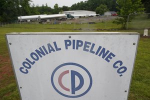 Tanker trucks are parked near the entrance of Colonial Pipeline Company Wednesday, May 12, 2021, in Charlotte