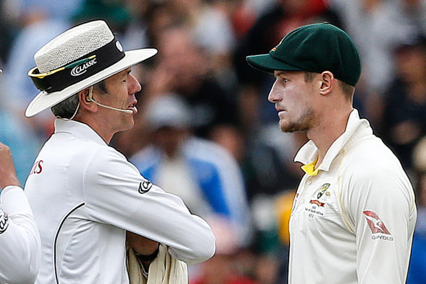 Caught: Umpires Richard Illingworth (left) and Nigel Llong confront Cameron Bancroft in Cape Town, scene of the sandpapergate crime.