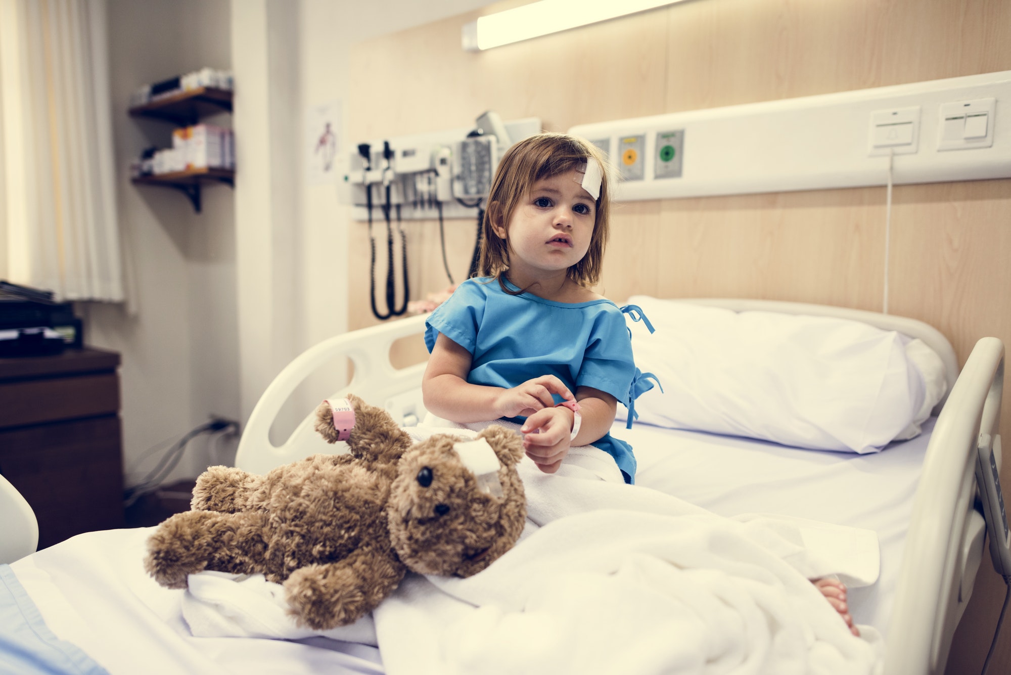 Sick little girl in a hospital