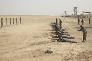 File - Afghan National Army soldiers with 2nd Kandak, 4th Brigade, 215th Corps fire M16A4 rifles during a battlesight zero range at Camp Shorabak, Afghanistan, June 4, 2017.