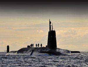 File - Nuclear submarine HMS Vanguard arrives back at HM Naval Base Clyde, Faslane, Scotland following a patrol. HMS Vanguard of the Royal Navy is the lead boat of her class of Trident ballistic missile-armed submarines.