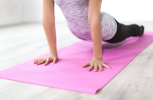 Person performing yoga exercise