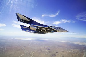 FILE - In this May 29, 2018 photo, provided by Virgin Galactic, the VSS Unite takes to the skies during a supersonic flight test