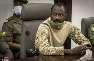 Col. Assimi Goita who has declared himself the leader of the National Committee for the Salvation of the People meets with a high-level delegation from the West African regional bloc known as ECOWAS, at the Ministry of Defense in Bamako, Mali, Saturday, Aug. 22, 2020