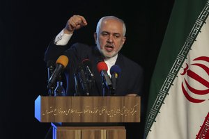 Iran's Foreign Minister Mohammad Javad Zarif addresses in a conference in Tehran, Iran, Tuesday, Feb. 23, 2021