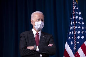 President Joe Biden listens as Vice President Kamala Harris delivers remarks to Department of Defense personnel, with Secretary of Defense Lloyd J. Austin III, the Pentagon, Washington, D.C., Feb. 10, 2021.