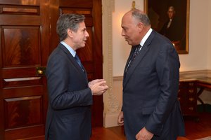 Deputy Secretary of State Antony "Tony" Blinken chats with Egyptian Foreign Minister Sameh Shoukry before the Foreign Minister and U.S. Secretary of State John Kerry signed a U.S.-Egypt cultural property agreement, at the U.S. Department of State in Washington, D.C., on November 30, 2016