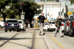 Law enforcement officers respond to the scene of a shooting at a Santa Clara Valley Transportation Authority (VTA) facility on Wednesday, May 26, 2021, in San Jose, California