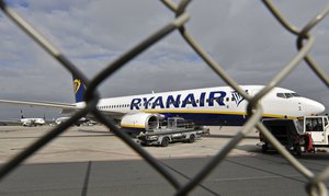 In this Wednesday, Sept. 12, 2018 file photo, a Ryanair plane is parked at the airport in Weeze, Germany.