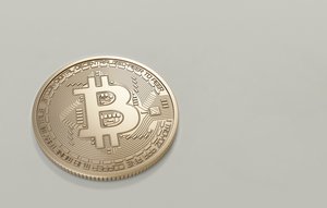 Round gold-colored Bitcoin