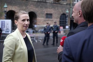 Mette Frederiksen speaking to a media