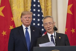 Donald J. Trump listens as Liu He delivers remarks prior the signing ceremony of the Phase One trade deal