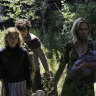 Regan (Millicent Simmonds), Marcus (Noah Jupe) and Evelyn (Emily Blunt) brave the unknown in A Quiet Place Part II.