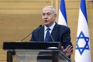 Israeli Prime Minister Benjamin Netanyahu speaks to the Israeli Parliament in Jerusalem, Sunday, May 30, 2021