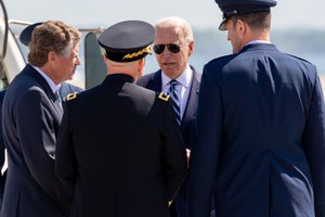 Rhode Island Governor Daniel McKee, U.S. Army Maj. Gen. Christopher P. Callahan, the Adjutant General of the Rhode Island National Guard, and Col. Adam G. Wiggins, the 143d Airlift Wing Commander, welcome U.S. President Joe Biden to Rhode Island, May 19, 2021, 2021, Quonset Air National Guard Base, North Kingstown, R.I. Biden stopped at QANGB on his way to deliver remarks at the U.S. Coast Guard Academy’s 140th commencement exercise in New London, Conn.