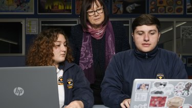 Rooty Hill High School Principal Chris Cawsey with year 10 students Owen Munday and Vanessa Stuparu. 