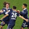 Melbourne Victory’s Lleyton Brooks (centre) scores late in a thrilling finish.