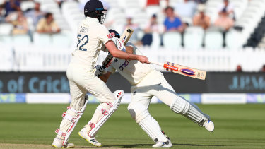 LONDON, ENGLAND - JUNE 06: Joe Root of England collides with Dom Sibley as they take a run during Day 5 of the First LV= Insurance Test Match between England and New Zealand at Lord’s Cricket Ground on June 06, 2021 in London, England. (Photo by Michael Steele/Getty Images)