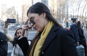 Emma Coronel Aispuro, the wife of Mexican drug lord Joaquin "El Chapo" Guzman, leaves U.S. District Court in Brooklyn after the jury at El Chapo's U.S. trial ended its first day of deliberations without reaching a verdict, Monday, Feb. 4, 2019, in New York