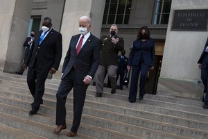 President Joe Biden and Vice President Kamala Harris walk with Secretary of Defense Lloyd J. Austin III and Chairman of the Joint Chiefs of Staff Army Gen. Mark A. Milley, at the conclusion of a Pentagon visit, Washington, D.C., Feb. 10, 2021.