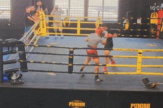 Boxer Justis Huni hits the canvas during sparring in January.