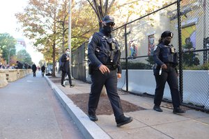 Police officers during election protests at BLM Plaza, in Washington, D.C.