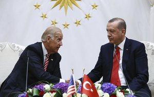 FILE- In this Wednesday, Aug. 24, 2016 file photo, then U. S. Vice President Joe Biden, left, talks to Turkey's President Recep Tayyip Erdogan during a meeting in Ankara, Turkey.