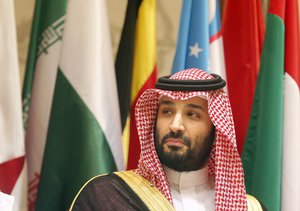 Saudi Crown Prince Mohammed bin Salman poses during a group picture ahead of Islamic Summit of the Organization of Islamic Cooperation (OIC) in Mecca, Saudi Arabia, early Saturday, June 1, 2019.