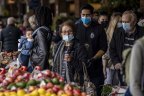 Shoppers with masks at South Melbourne Market as Melbourne’s COVID-19 restrictions continue. 