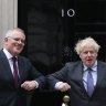 Giving the FTA a nudge ... prime ministers Scott Morrison and Boris Johnson outside Downing Street.