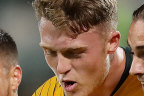 Goal-scorer Harry Souter, centre, with Socceroo teammates in 2019.