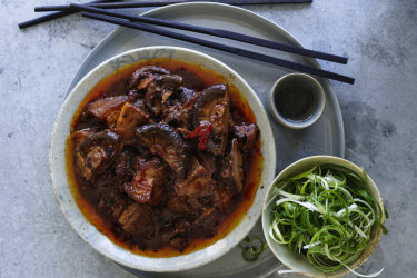 Braised pork belly with black beans and shiitake mushrooms.