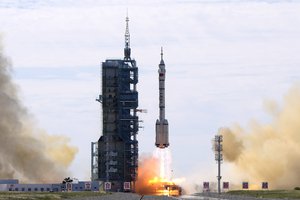 A Long March-2F Y12 rocket carrying a crew of Chinese astronauts in a Shenzhou-12 spaceship lifts off at the Jiuquan Satellite Launch Center in Jiuquan in northwestern China, Thursday, June 17, 2021