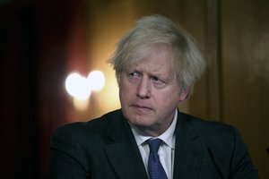 Britain's Prime Minister Boris Johnson speaks during a coronavirus press conference at 10 Downing Street in London, Friday Jan. 22, 2021.