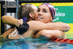 Australian swimmers Madison Wilson and Emma McKeon embrace after a race during last week’s Olympic trials.