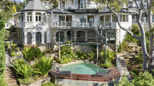 Grand north shore house soars $1.4m above reserve at auction