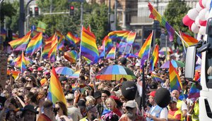 People take part in the Equality Parade, the largest gay pride parade in central and eastern Europe, in Warsaw, Poland, Saturday June 19, 2021.