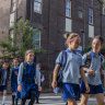 Parents and students outside Chatswood Public School. 