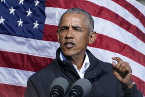 In this Nov. 2, 2020 file photo, former President Barack Obama speaks at a rally as he campaigns for Democratic presidential candidate former Vice President Joe Biden in Atlanta