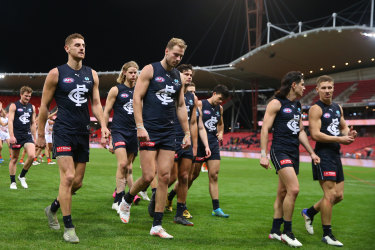 Carlton leave the field after losing to GWS.