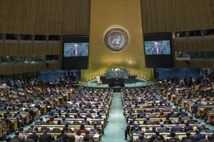 Secretary-General Antonio Guterres (on screens and at podium) addresses the opening of the general debate of the seventy-fourth session of the General Assembly, 24 September 2019.