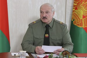 Belarusian President Alexander Lukashenko attends a meeting on territorial defense issues in the town of Shklov, 220 km (137 miles) east of Minsk, Belarus, Wednesday, June 16, 2021