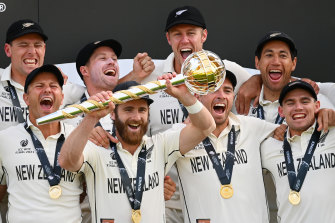 Kane Williamson holds the World Test Championship mace aloft.