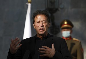 Pakistan Prime Minister Imran Khan speaks during a joint news conference with Afghan President Ashraf Ghani at the Presidential Palace in Kabul, Afghanistan, Thursday, Nov. 19, 2020