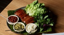 Babi guling (roasted suckling pig with sambals and fresh herbs), a daily special at Aru, Melbourne.