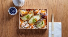 Glacier 51 toothfish dish and baked saikyo miso cod served over sushi rice with king crab meat, Japanese whitebait and ...