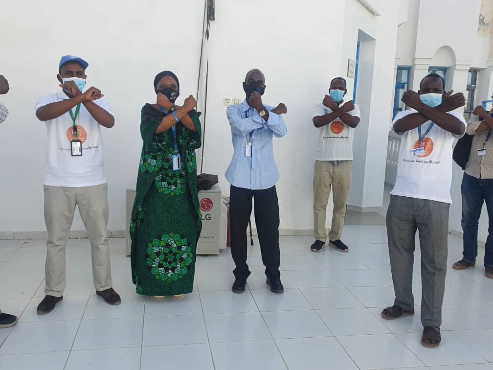 Men colleagues in South Darfur joined by the Head of Office